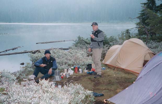 Peter and Pat having breakfast on the shores of Lake Janus ... one day from Steven's Pass