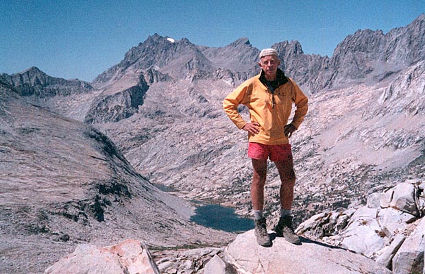 Peter standing on Mather Pass ... the 14,000' plus peaks of the Palisades behind