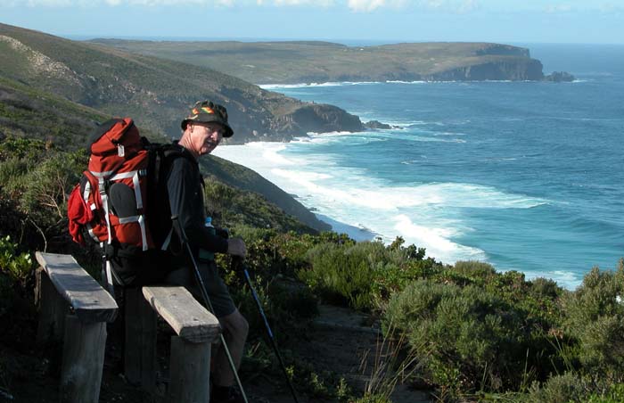 Mal resting on a handy seat with West Cape Howe behind