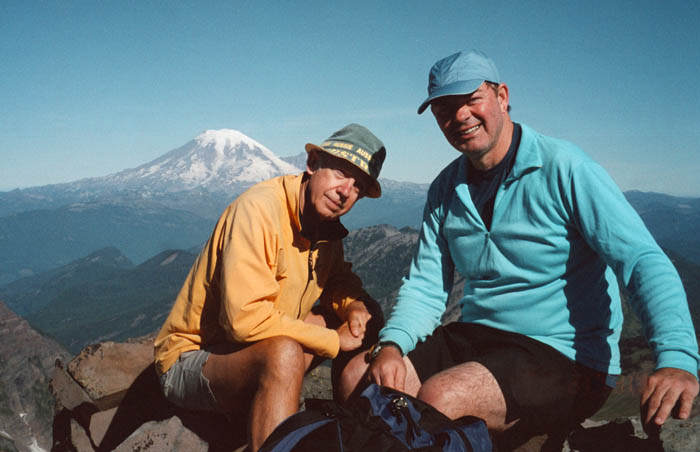 Peter and Jim Keogh resting on the summit of Old Snowy (8,000') ... Mount Rainier in the background