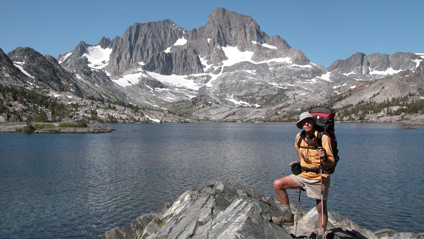 Peter standing above Garnet Lake with Ritter and Banner Peaks behind