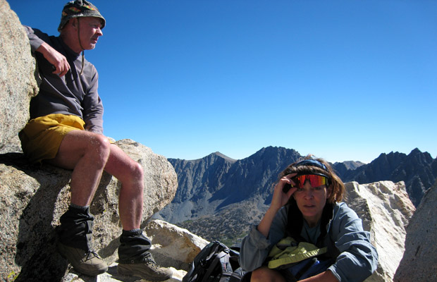 Mal and Lucy resting on the summit rocks of Mount Goode, 13,100'