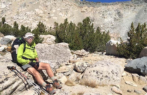 Peter resting by the lake on the southern side of Glen Pass