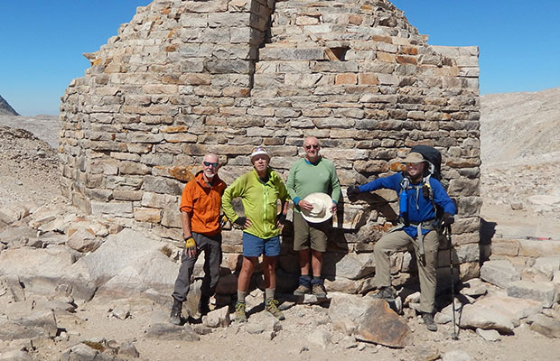Bob, Peter, Mike and Ben standing by the Muir Hut, on Muir Pass [12,000']