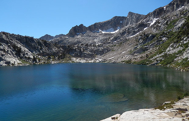 Standing on the isthmus dividing the lake, looking back to my original photo position last year.