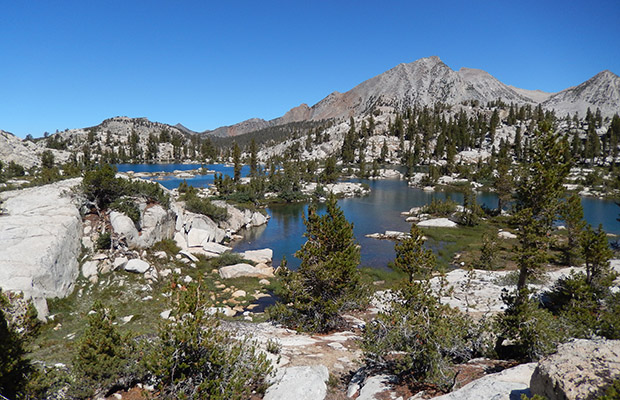 Standing on the isthmus dividing the lake, looking at the many rock islands of Hortense.