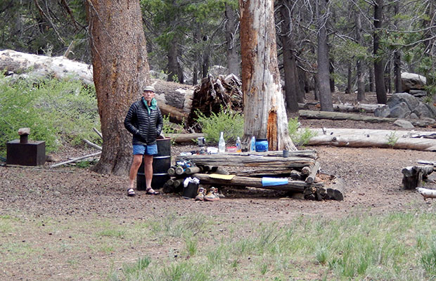 The rustic picnic table by Bear Trap creek campsite on Summit Meadow. 
