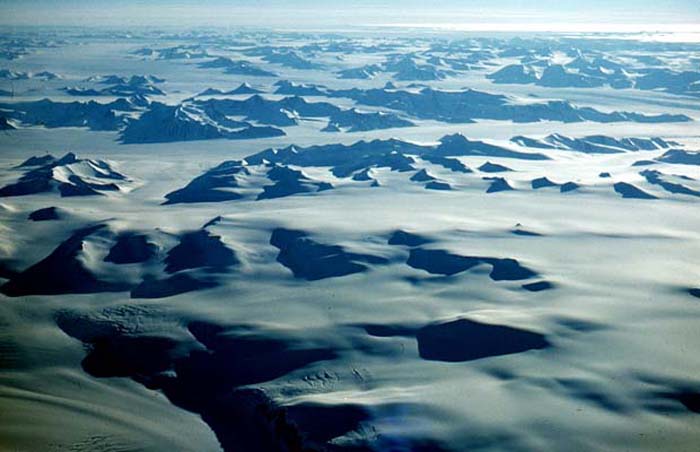 The Antarctic continent from 24,000 feet, flying south over Cape Adare to McMurdo Base.