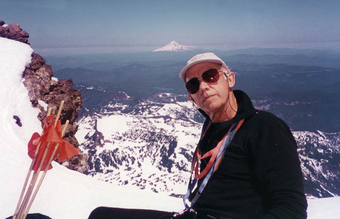 1997: Peter resting at our high point for the climb - Mount Hood in the backgound