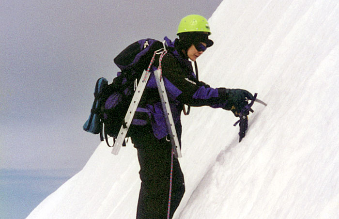 1997: Lucy leading the belayed traverse across, and up to the summit pinnacle