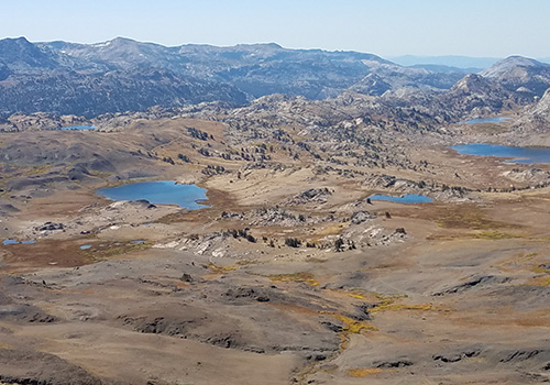 On Big Sam summit looking down to the lakes of Emigrant Wilderness.