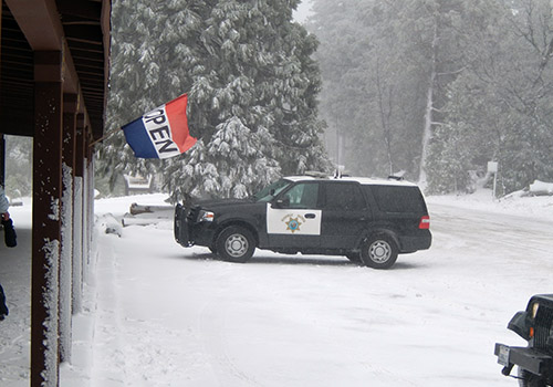 A Highway Patrol officer in the blizzard at the Laguna Lodge and Store