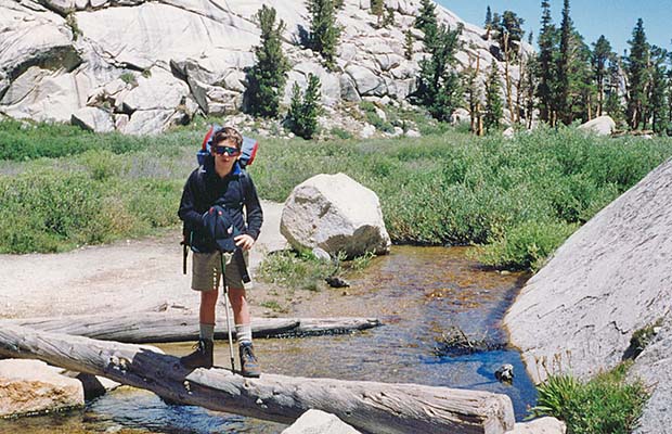 August 1993: Jordan crossing the creek near Outpost Camp.